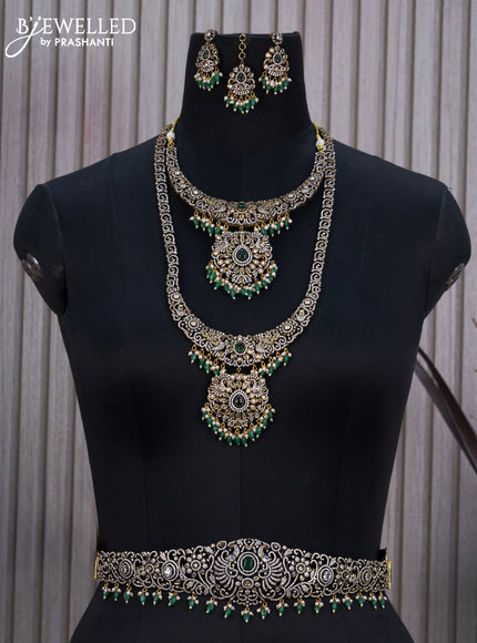 Bridal set with emerald & cz stones and beads hangings in victorian finish