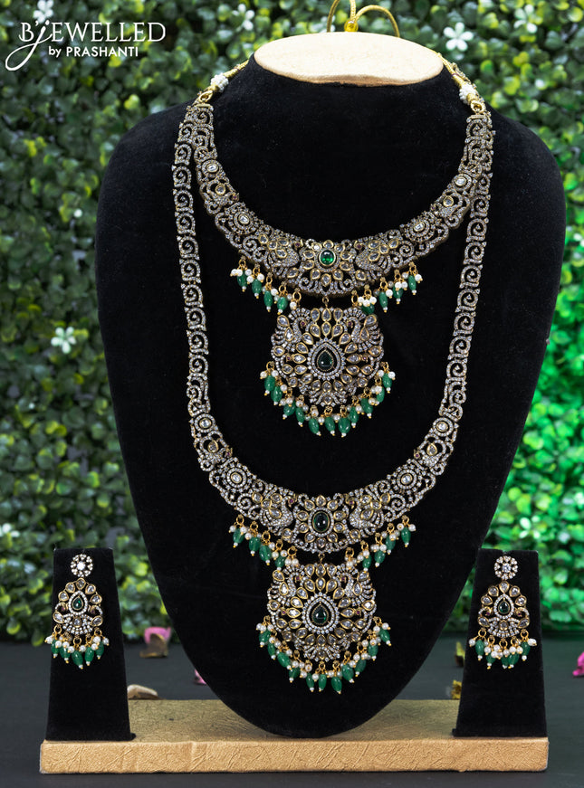 Bridal set with emerald & cz stones and beads hangings in victorian finish