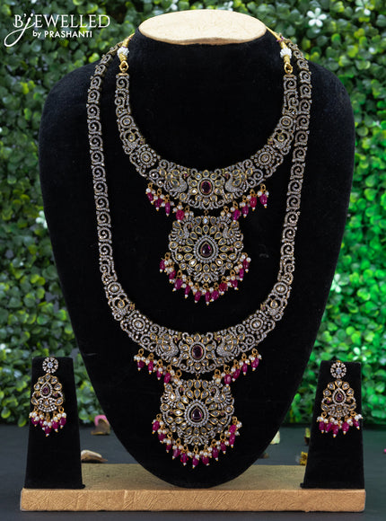 Bridal set peacock design with ruby & cz stones and beads hangings in victorian finish