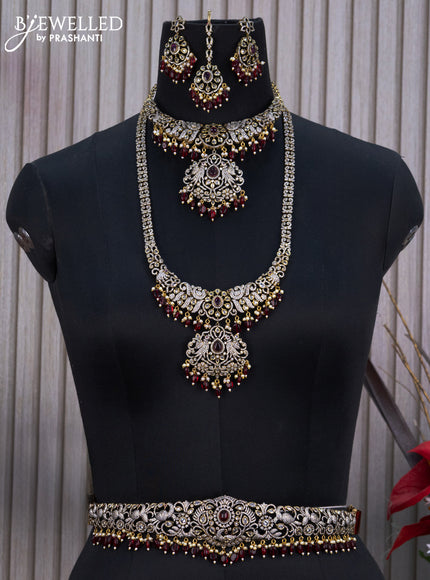 Bridal set peacock design with ruby & cz stones and beads hangings in victorian finish