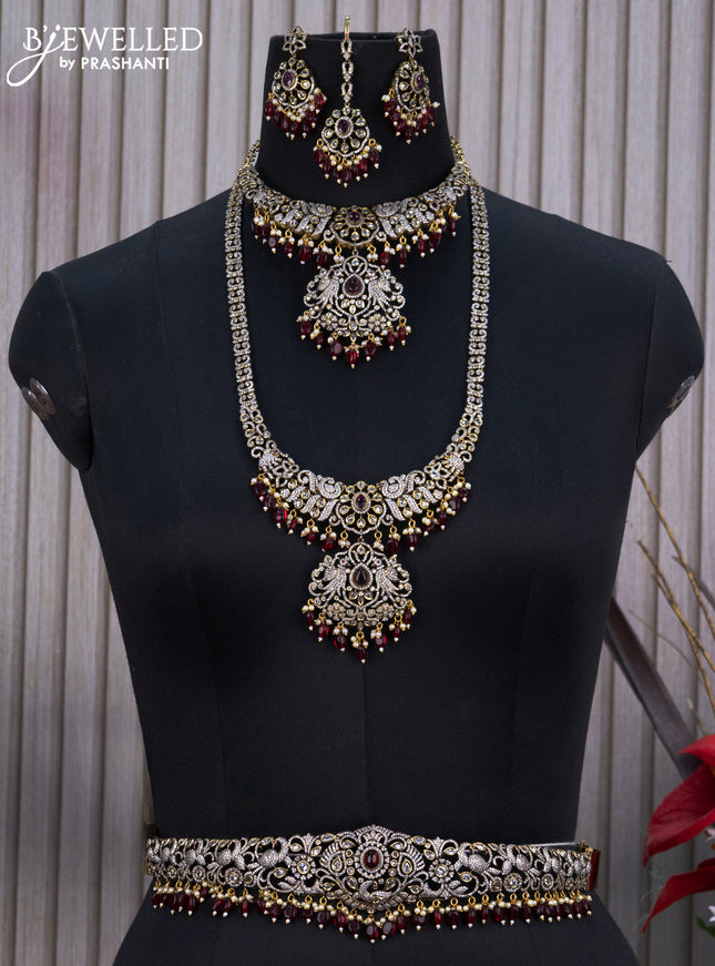Bridal set peacock design with ruby & cz stones and beads hangings in victorian finish