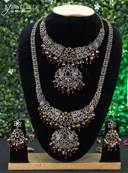 Bridal set peacock design with ruby & cz stones and beads hangings in victorian finish