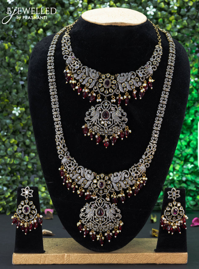 Bridal set peacock design with ruby & cz stones and beads hangings in victorian finish