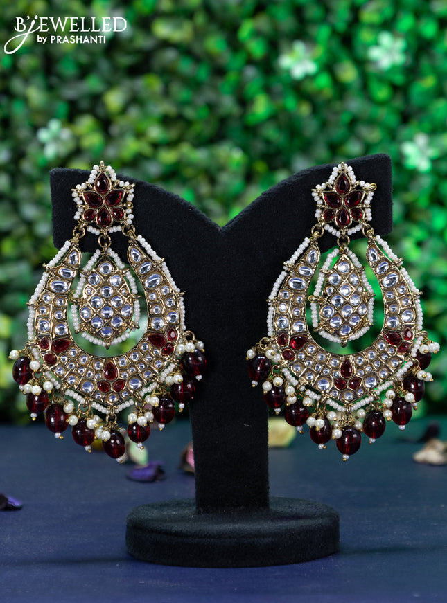 Fashion dangler maroon earrings with kundan stones and beads hangings