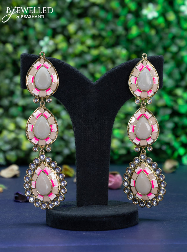 Fashion dangler minakari earrings with peach shade and kundan stones