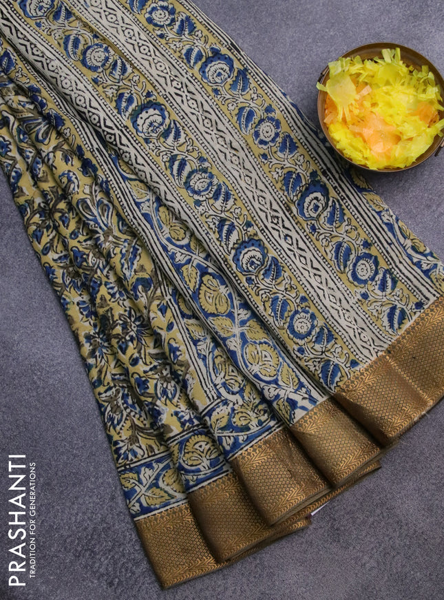 Semi mangalgiri silk saree yellow and mehendi green with allover kalamkari block prints and zari woven border