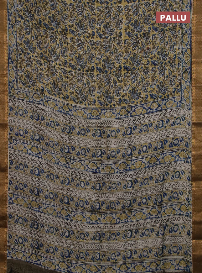 Semi mangalgiri silk saree yellow and mehendi green with allover kalamkari block prints and zari woven border