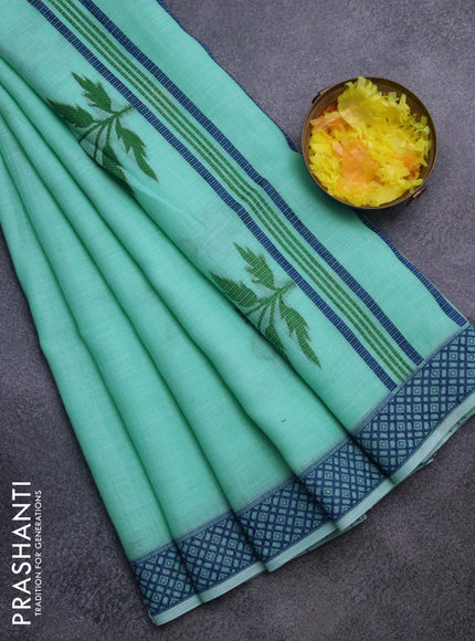 Munga linen saree teal green and blue with thread woven floral buttas and thread woven border