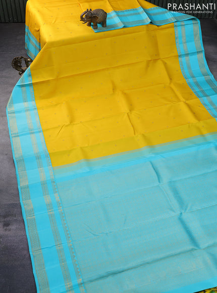Pure kanchipuram silk saree yellow and light blue with zari woven buttas and zari woven border