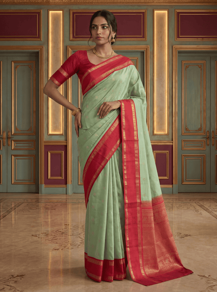 Pure kanchipuram silk saree pastel green and red with annam zari woven buttas and rettapet zari woven border