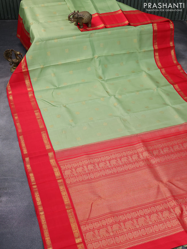 Pure kanchipuram silk saree pastel green and red with annam zari woven buttas and rettapet zari woven border