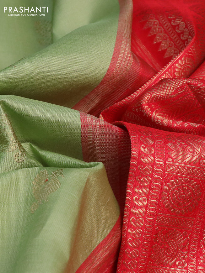 Pure kanchipuram silk saree pastel green and red with annam zari woven buttas and rettapet zari woven border
