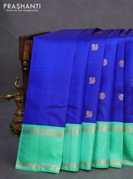 Pure kanchipuram silk saree blue and teal green with annam zari woven buttas and rettapet zari woven border