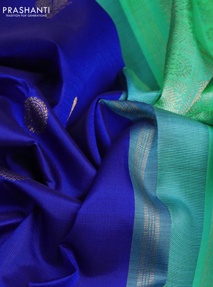 Pure kanchipuram silk saree blue and teal green with annam zari woven buttas and rettapet zari woven border