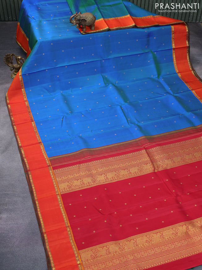 Pure kanchipuram silk saree dual shade of cs blue and orange with zari woven buttas and rettapet zari woven border