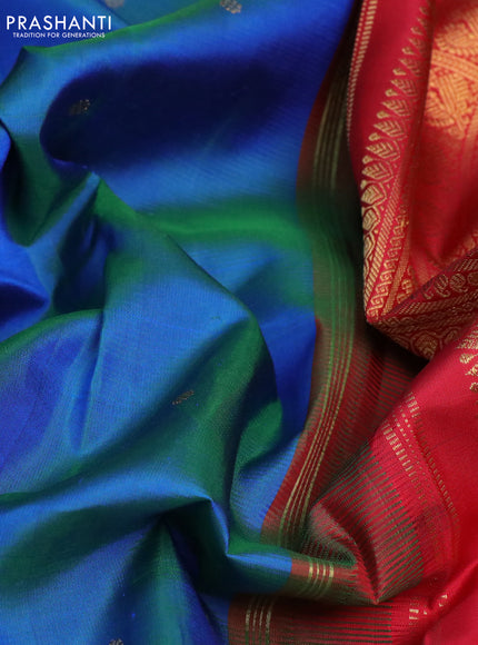 Pure kanchipuram silk saree dual shade of cs blue and orange with zari woven buttas and rettapet zari woven border
