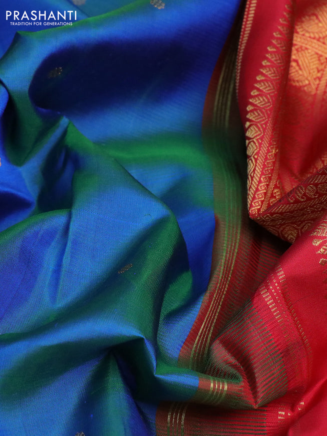 Pure kanchipuram silk saree dual shade of cs blue and orange with zari woven buttas and rettapet zari woven border