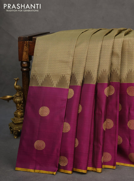 Pure kanchipuram silk saree military green and purple with allover zari woven brocade weaves and long zari woven butta border