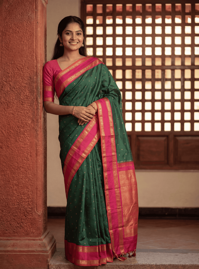 Pure kanchipuram silk saree dark green and pink with allover zari weaves & buttas and rettapet zari woven korvai border