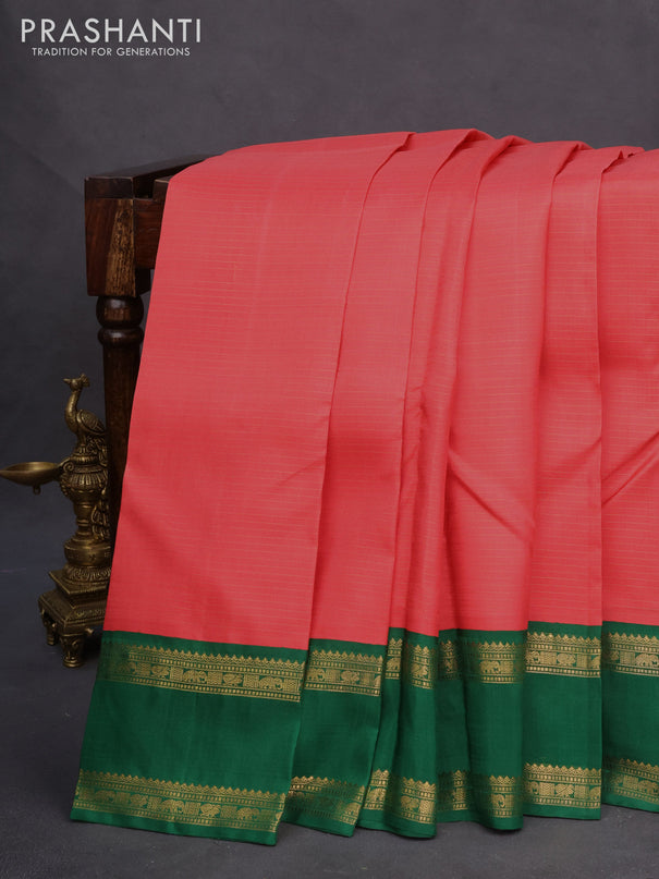 Pure kanchipuram silk saree peach shade and green with allover zari stripe pattern and rettapet zari woven korvai border