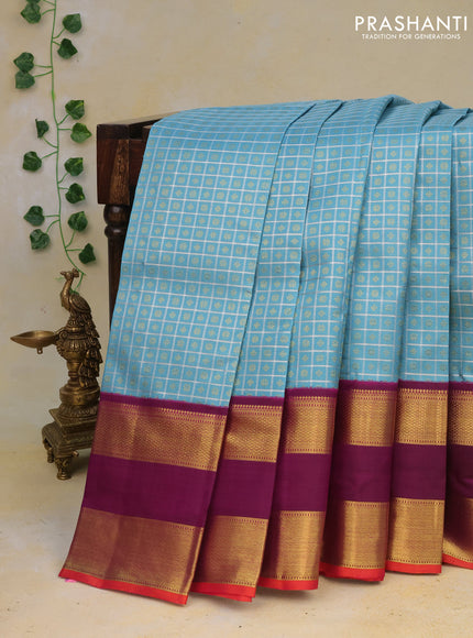 Pure kanchipuram silk saree light blue and purple with allover zari checks & 1000 buttas and rettapet zari woven korvai border