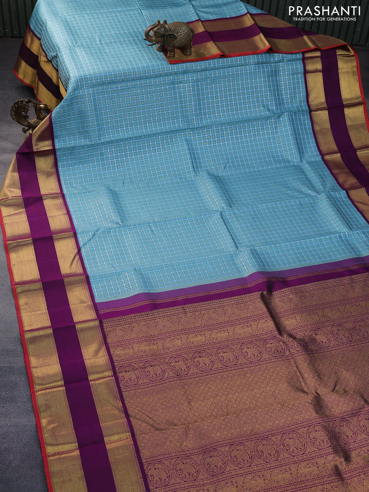 Pure kanchipuram silk saree light blue and purple with allover zari checks & 1000 buttas and rettapet zari woven korvai border
