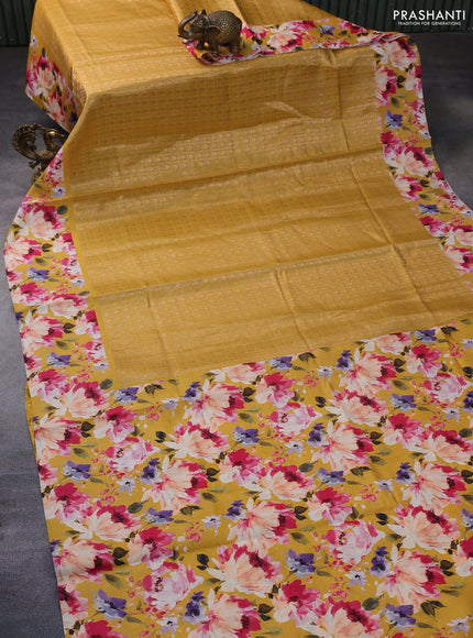 Banarasi silk saree mustard yellow with allover zari woven brocade weaves and floral digital printed border