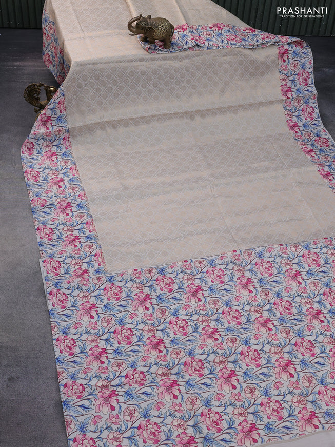 Banarasi silk saree cream with allover zari woven brocade weaves and floral digital printed border