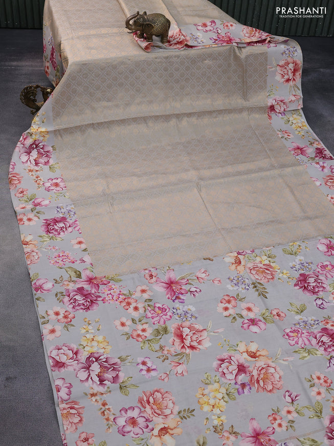 Banarasi silk saree pastel grey with allover zari woven brocade weaves and floral digital printed border