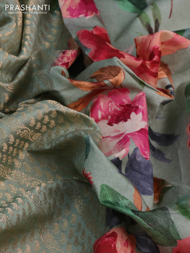 Banarasi silk saree pastel green with allover zari woven brocade weaves and floral digital printed border