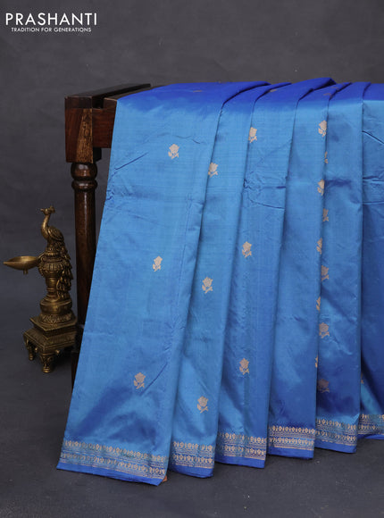 Banarasi katan silk saree blue shade with allover floral zari woven buttas and zari woven border