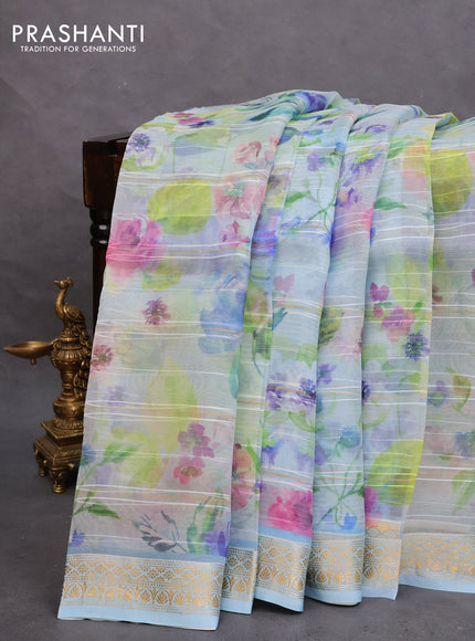 Pure banarasi organza silk saree pastel blue with floral digital prints & zari lines and zari woven border