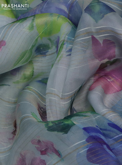 Pure banarasi organza silk saree pastel blue with floral digital prints & zari lines and zari woven border