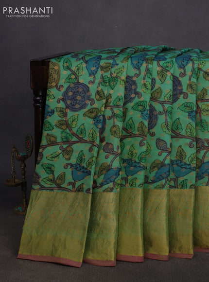 Pure kanchipuram silk saree pastel green and pink with allover pen kalamkari prints & zari buttas and zari woven border