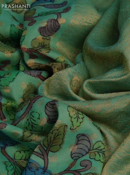 Pure kanchipuram silk saree pastel green and pink with allover pen kalamkari prints & zari buttas and zari woven border