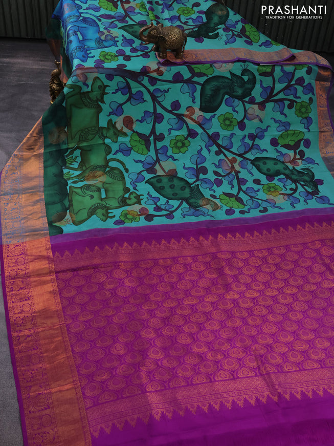 Pure kanchipuram silk saree teal blue and purple with allover pen kalamkari prints & zari buttas and copper zari woven border
