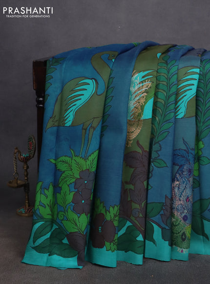 Pure kanchipuram silk saree blue shade and dual shade of pinkish orange with allover pen kalamkari prints in borderless style