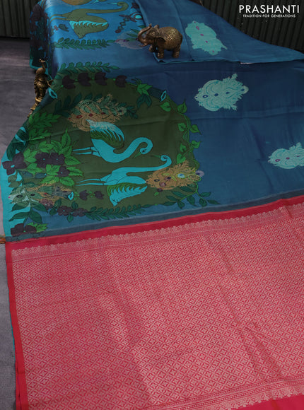 Pure kanchipuram silk saree blue shade and dual shade of pinkish orange with allover pen kalamkari prints in borderless style