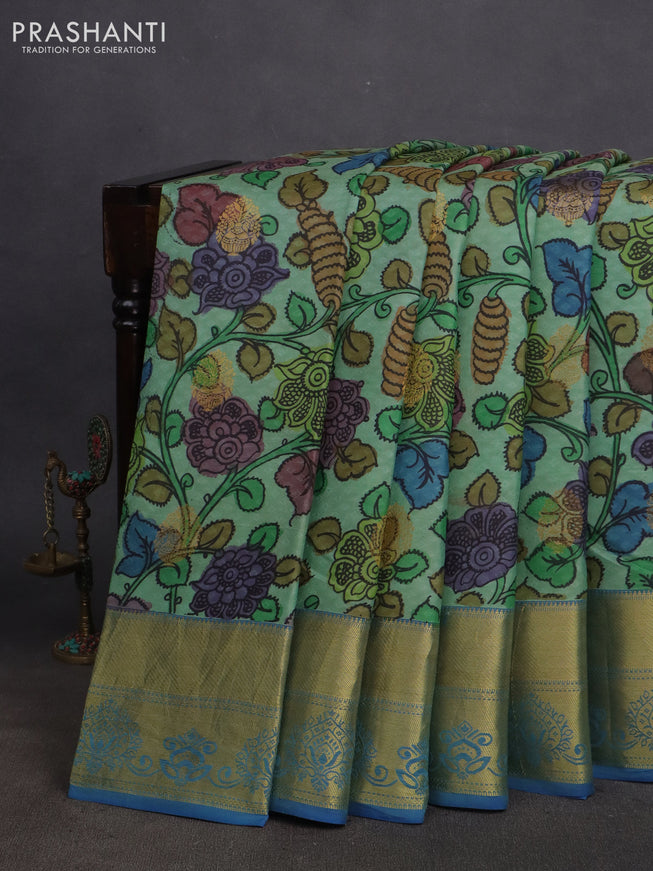 Pure kanchipuram silk saree pastel green and cs blue with self emboss & pen kalamkari prints and zari woven border