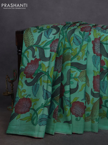 Pure kanchipuram silk saree teal shade and pink with allover pen kalamkari prints in borderless style