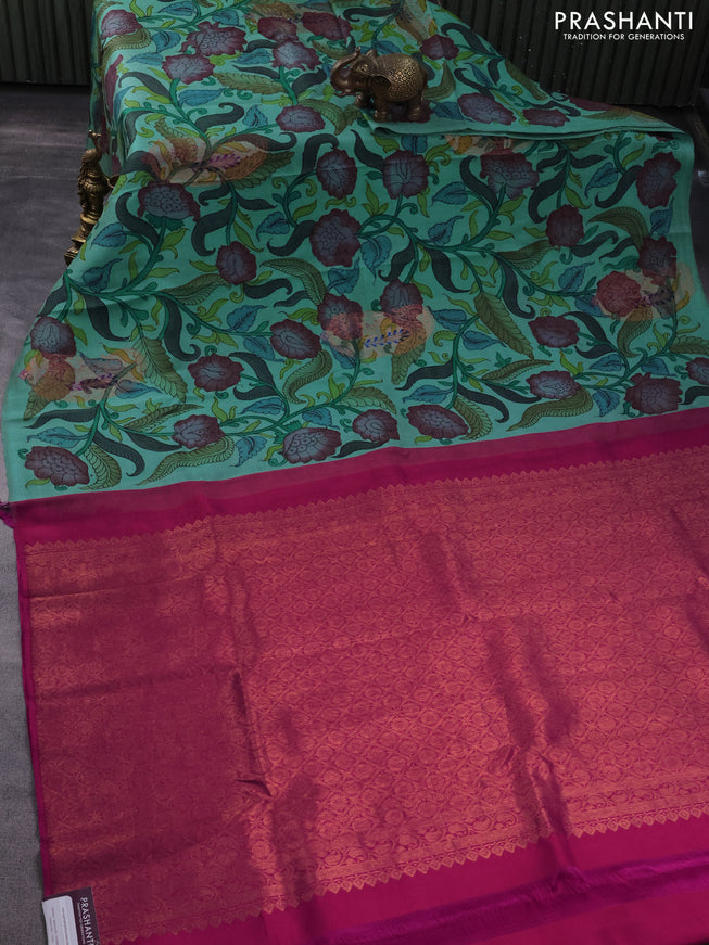 Pure kanchipuram silk saree teal shade and pink with allover pen kalamkari prints in borderless style