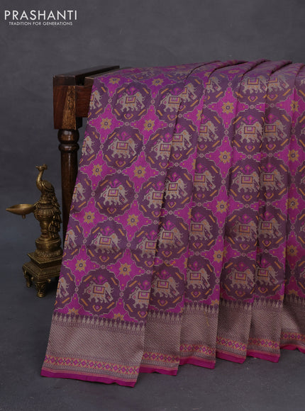 Banarasi uppada silk saree pastel wine shade with allover patola prints and zari woven border