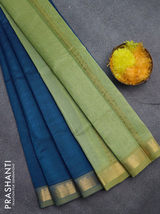 Silk cotton saree peacock blue and pastel green shade with plain body and zari woven border