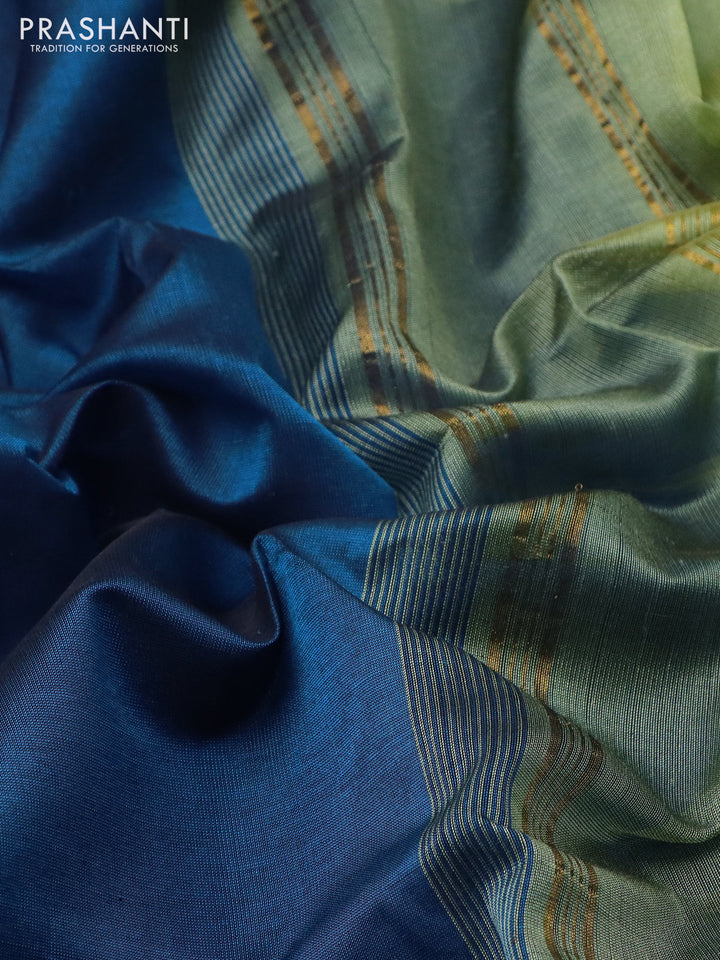 Silk cotton saree peacock blue and pastel green shade with plain body and zari woven border