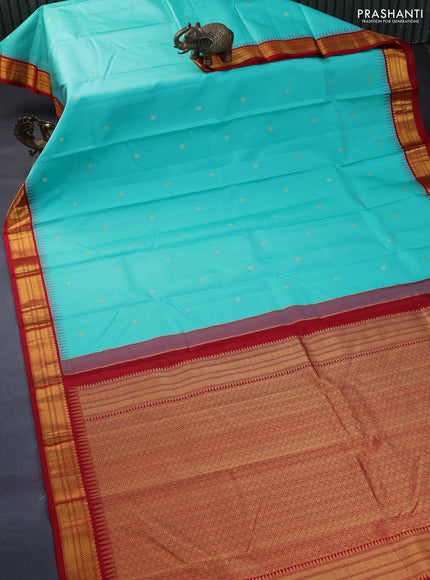 Pure kanchipuram silk saree light blue and red with zari woven buttas and temple design zari woven korvai border