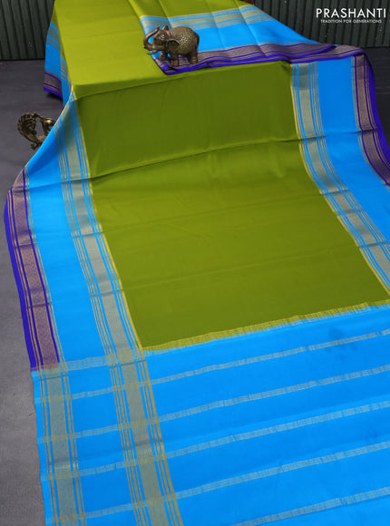 Pure mysore silk saree mehendi green and cs blue with plain body and long rettapet zari woven border