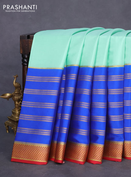 Pure mysore silk saree teal green shade and blue maroon with plain body and long zari woven border
