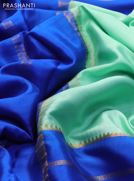Pure mysore silk saree teal green shade and blue maroon with plain body and long zari woven border