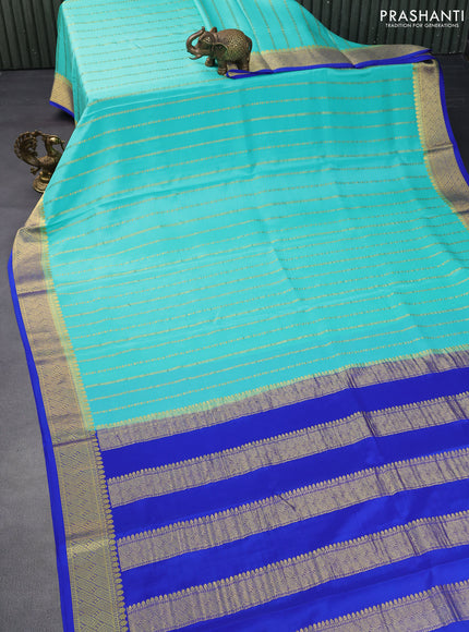 Pure mysore silk saree teal blue and blue with allover zari weaves and zari woven border