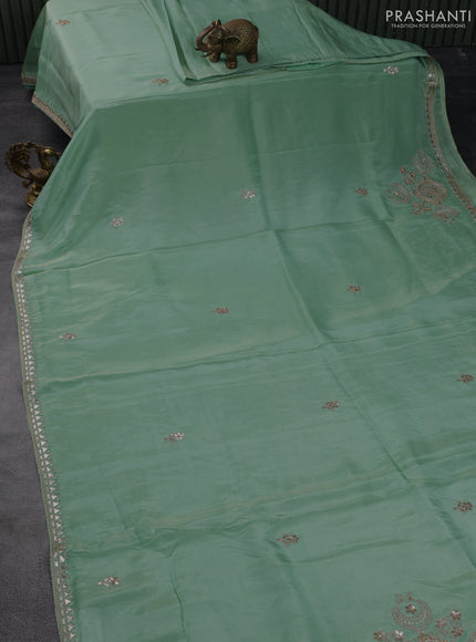 Tissue silk saree teal blue with gotapatti work buttas and gottapatti lace work border